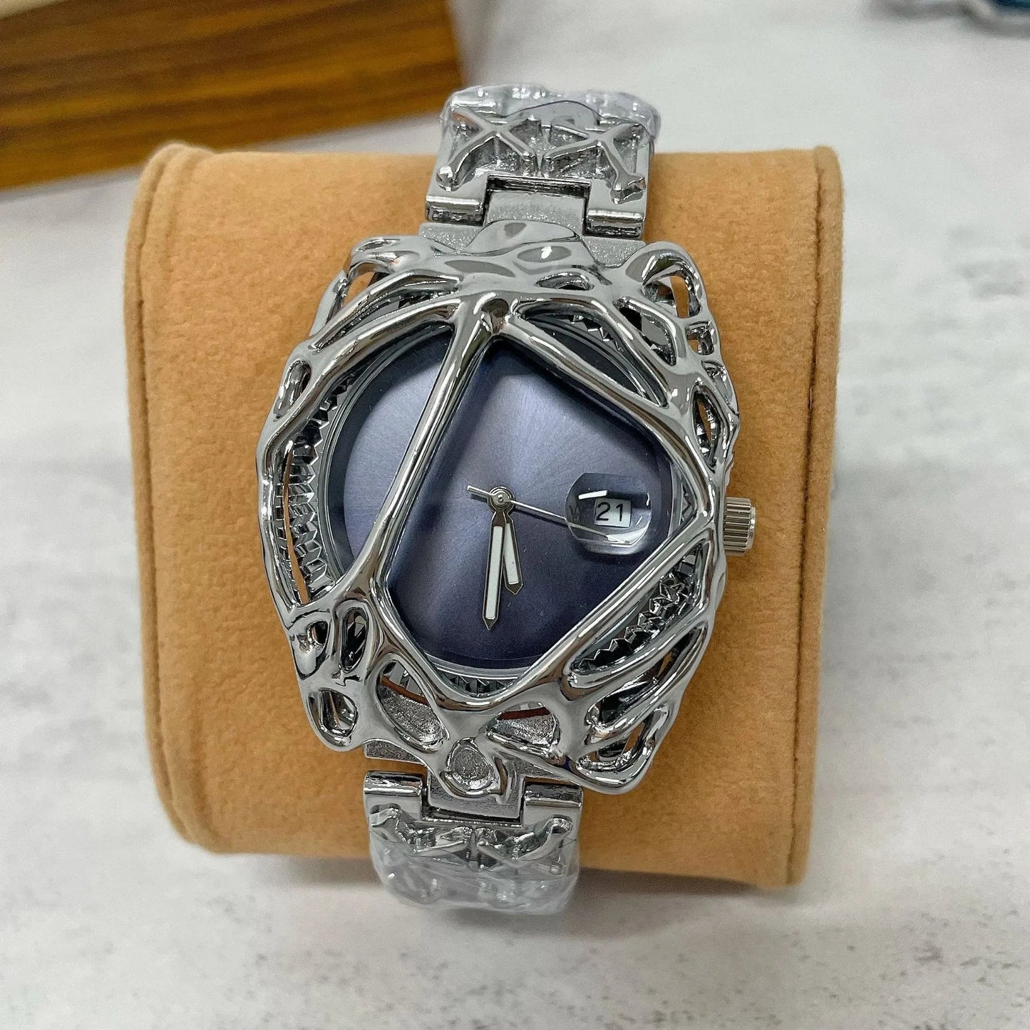 Renvar — Liquid Metal Frame Watch with Chrome Bracelet and Date Display