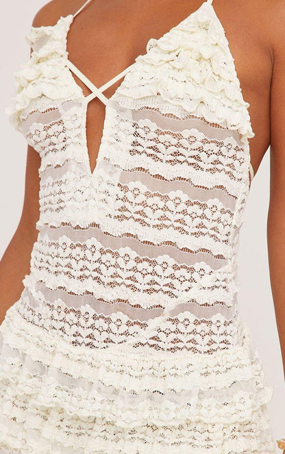 Eloria — Cream Textured Mini Dress with Halterneck Frills