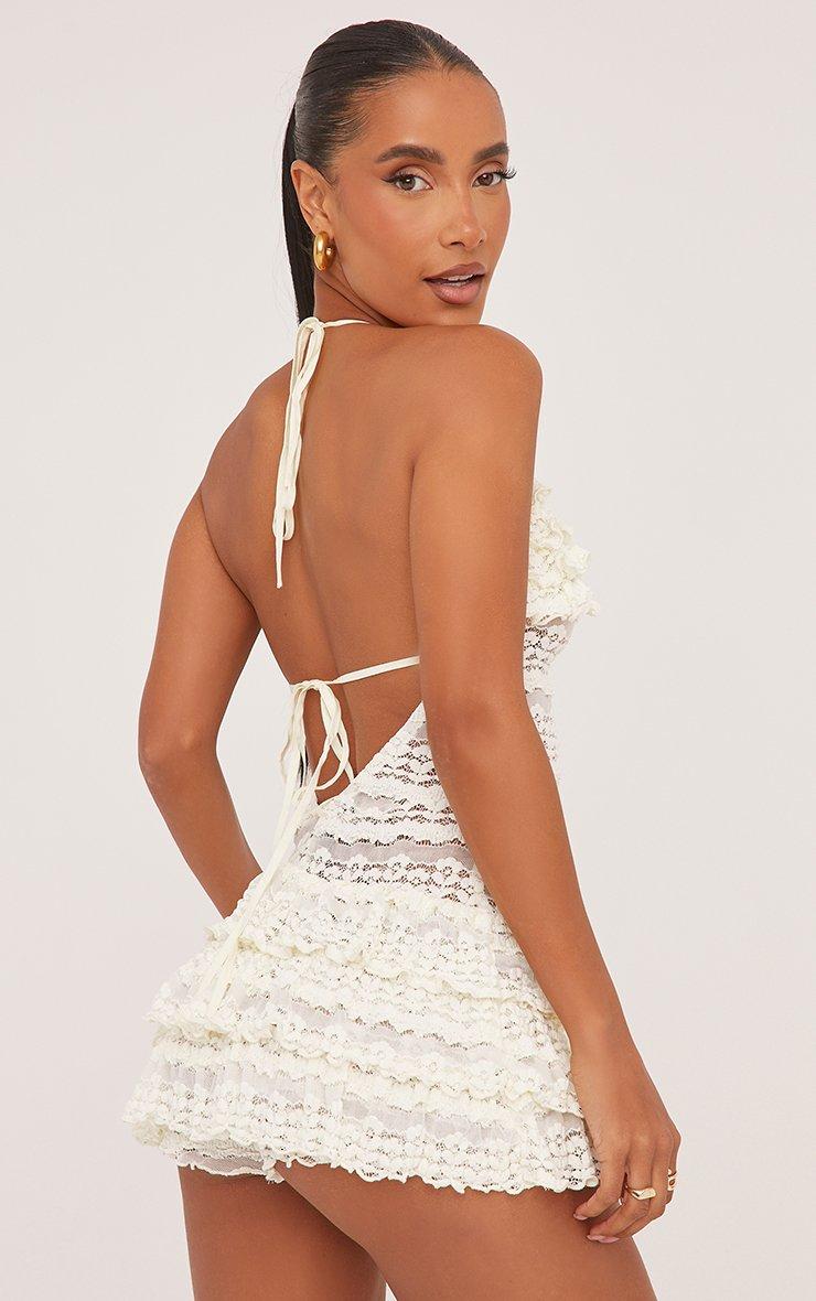 Eloria — Cream Textured Mini Dress with Halterneck Frills
